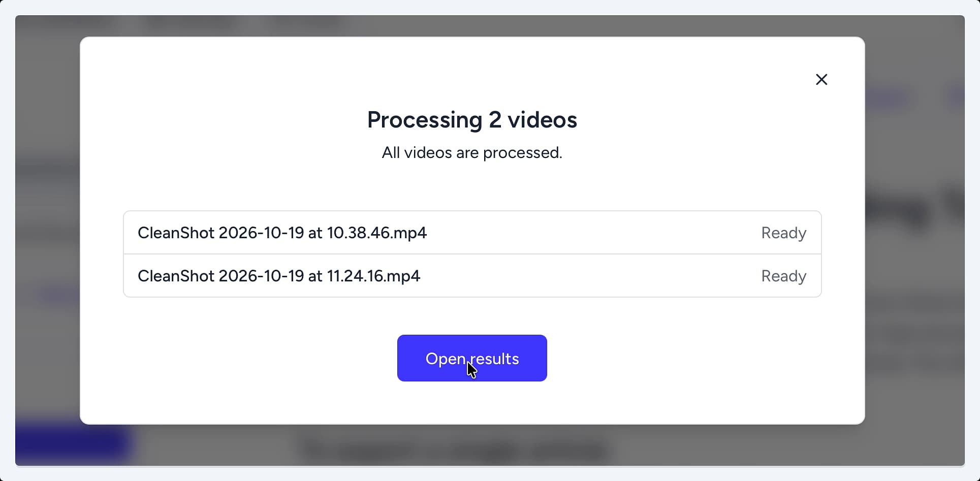 The Processing 2 videos modal confirming that all videos are processed and ready, with a prominent 'Open results' button. The Processing 2 videos modal confirming that all videos are processed and ready, with a prominent 'Open results' button.